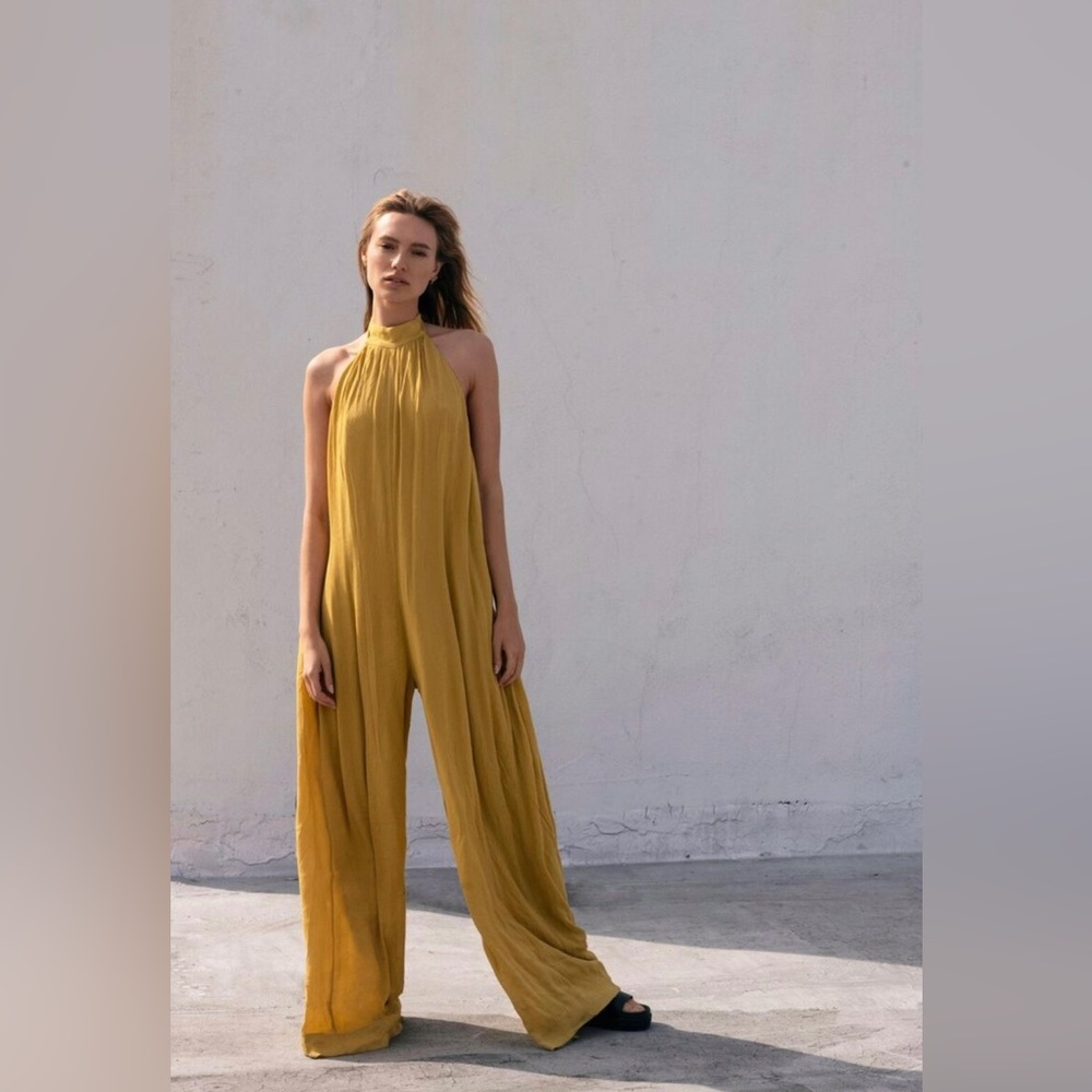 FREE PEOPLE DEEP END JUMPSUIT ENDLESS 

Size Medium new with tags